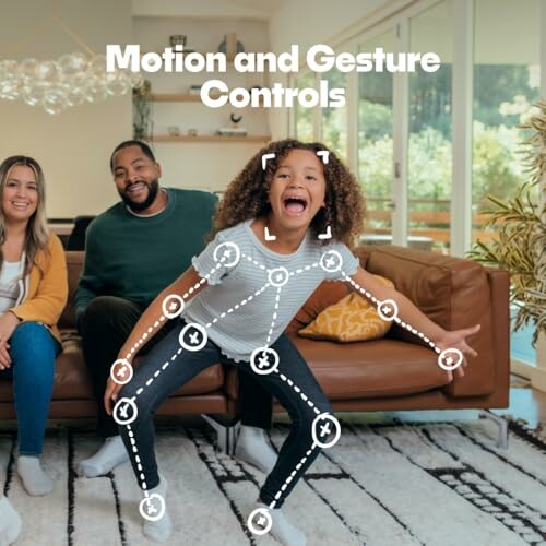 Child demonstrating motion and gesture controls with family on couch.
